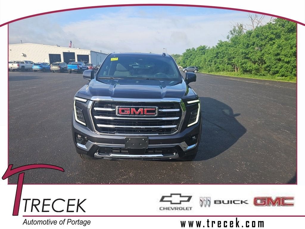 2026 GMC Yukon Elevation in Titanium Rush Metallic — front three-quarter view