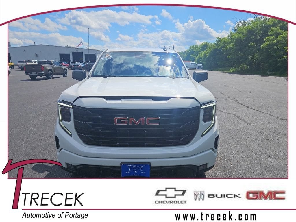 2023 GMC Sierra 1500 Elevation in Summit White — front three-quarter view